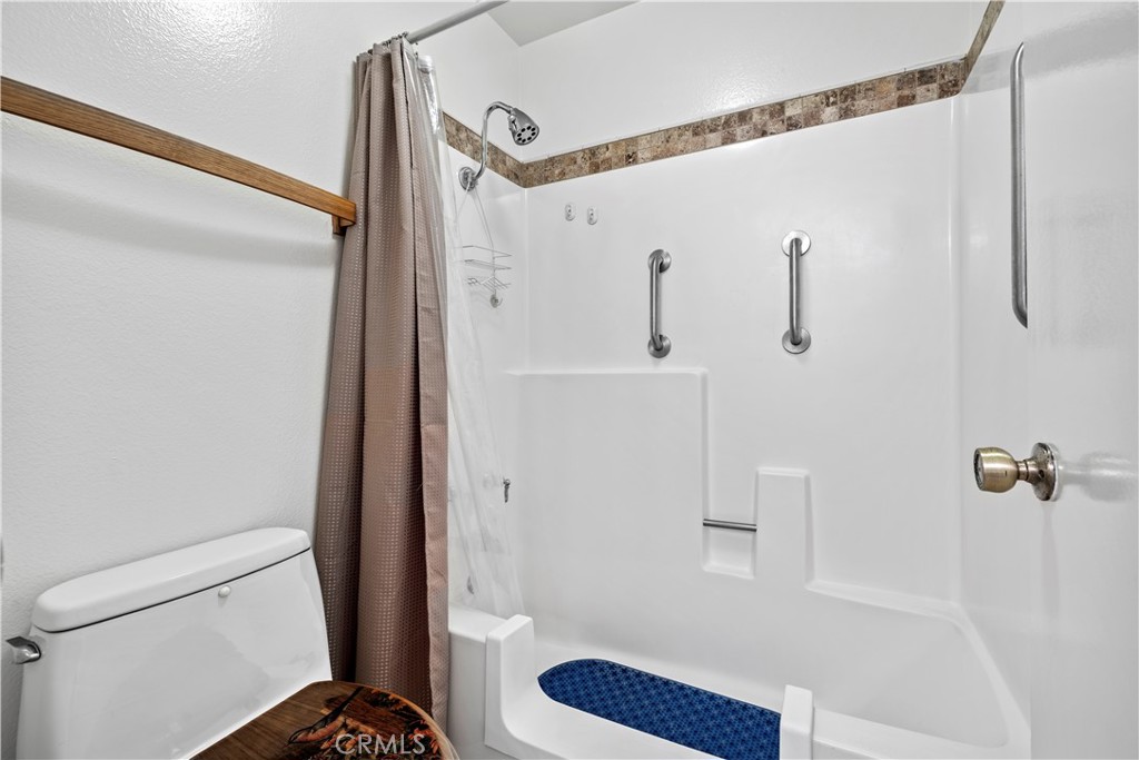 123 Fallingstar Irvine, CA 92614 - Photo 23 of 25 a bathroom with a shower and a toilet