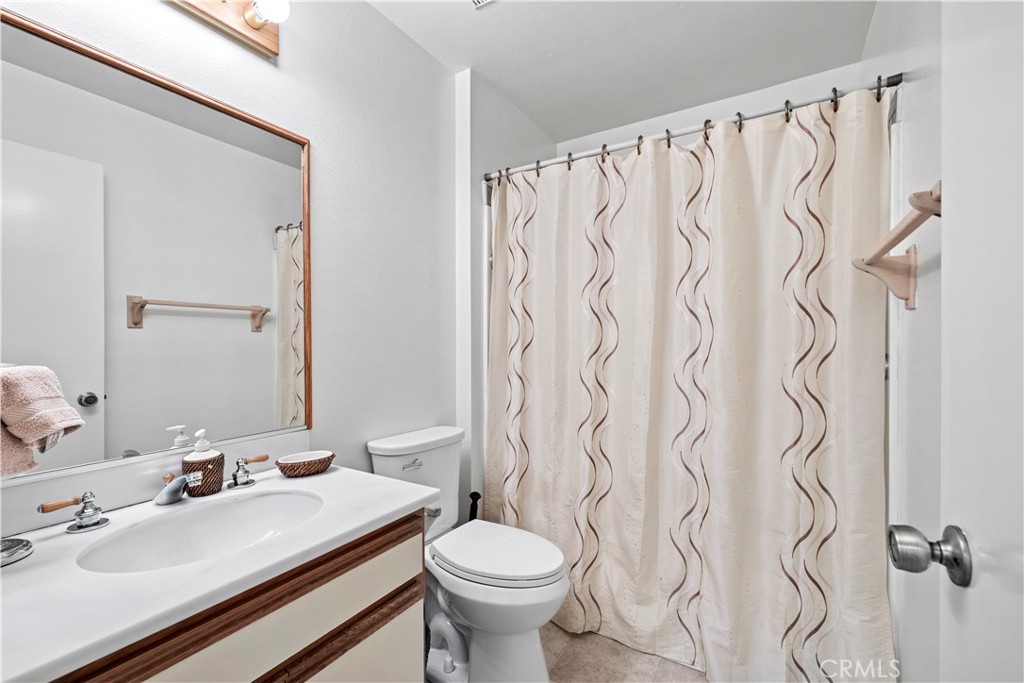 123 Fallingstar Irvine, CA 92614 - Photo 25 of 25 a bathroom with a sink and a mirror