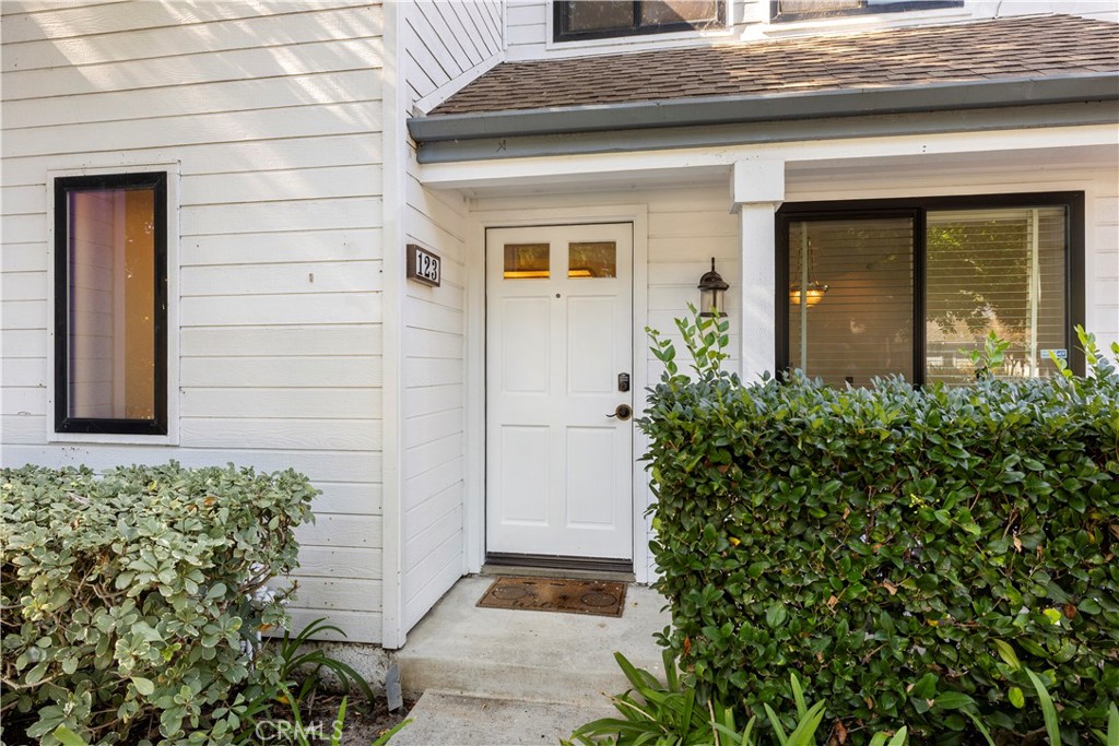 123 Fallingstar Irvine, CA 92614 - Photo 5 of 25 a potted plant sitting in front of a house