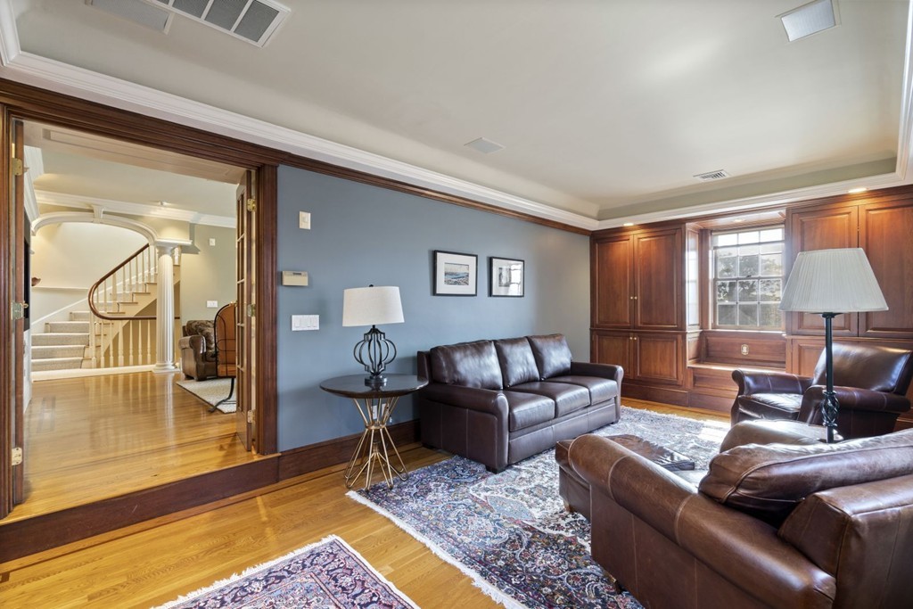 6 Monument Square, Unit 4 Boston, MA 02129 - Photo 13 of 37 a living room with furniture and a rug