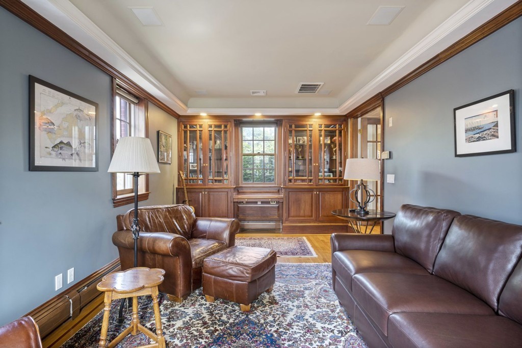 6 Monument Square, Unit 4 Boston, MA 02129 - Photo 14 of 37 a living room with furniture and a large window