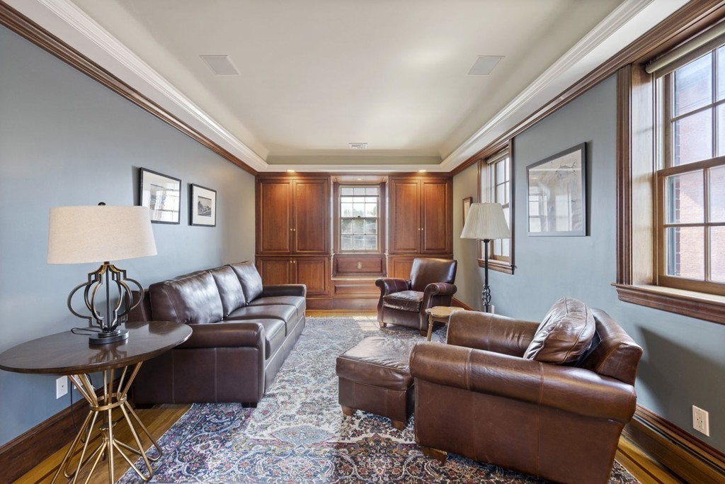 6 Monument Square, Unit 4 Boston, MA 02129 - Photo 15 of 37 a living room with furniture and a window