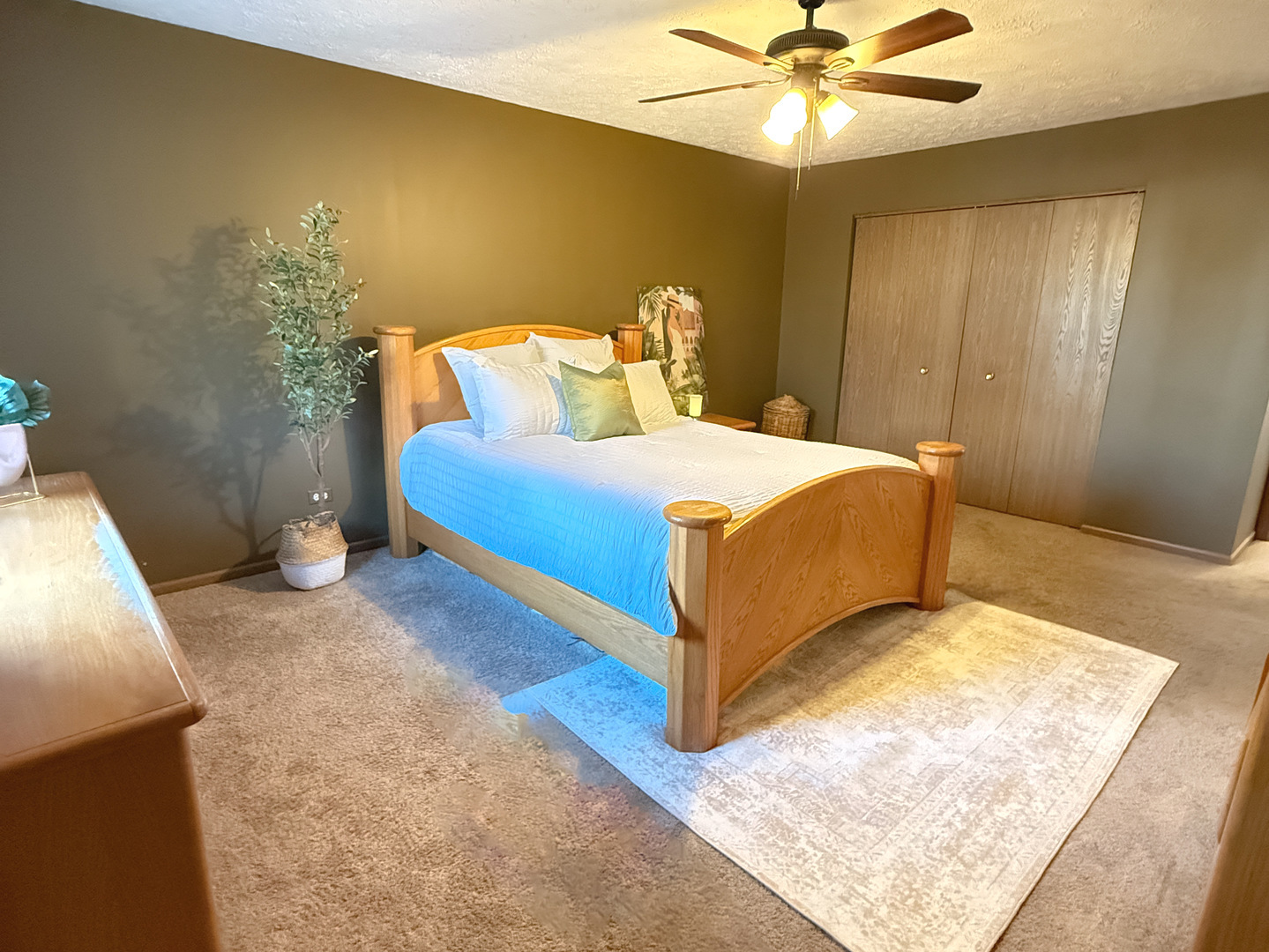 4208 Whitetail Court Joliet, IL 60431 - Photo 18 of 33 a bedroom with a bed and a table