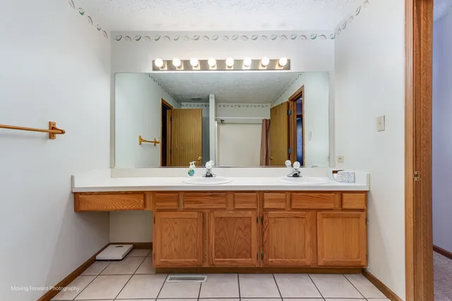 a bathroom with a shower and a tub
