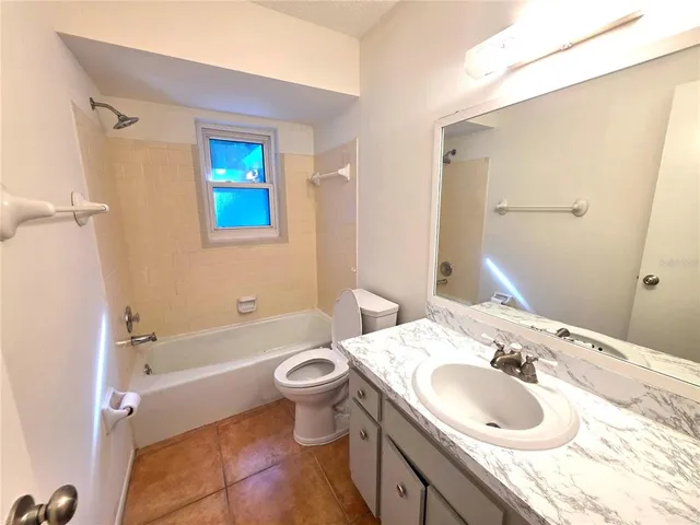 a bathroom with a sink and a bathtub