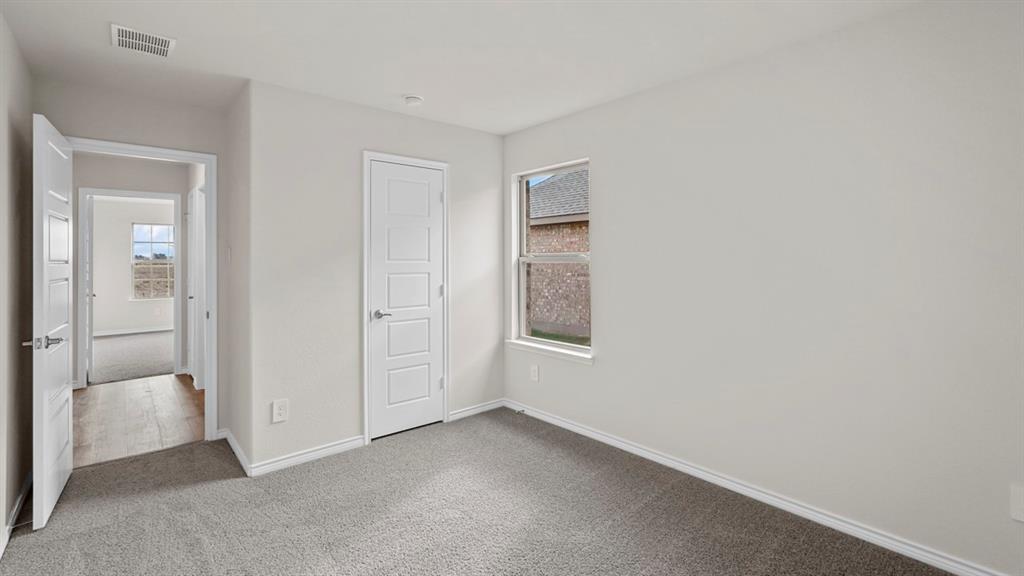 111 Lantern Road Caddo Mills, TX 75135 - Photo 27 of 40 a view of an empty room and window