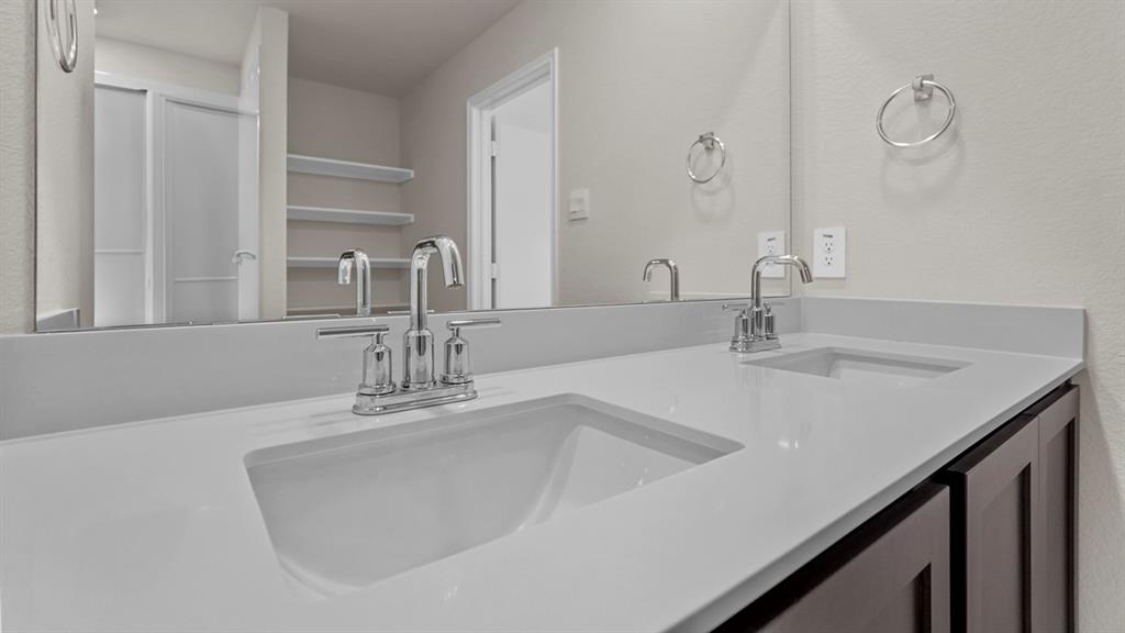 111 Lantern Road Caddo Mills, TX 75135 - Photo 32 of 40 a bathroom with a double vanity sink