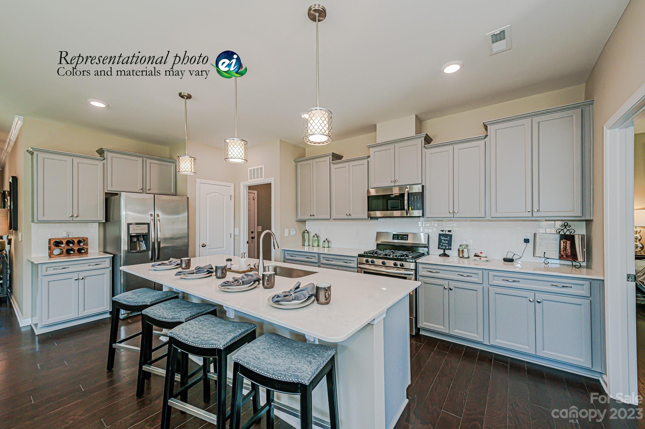 Tbd Gopher Road, Unit 332 Lancaster, SC 29720 - Photo 17 of 23 a kitchen with refrigerator cabinets and wooden floor