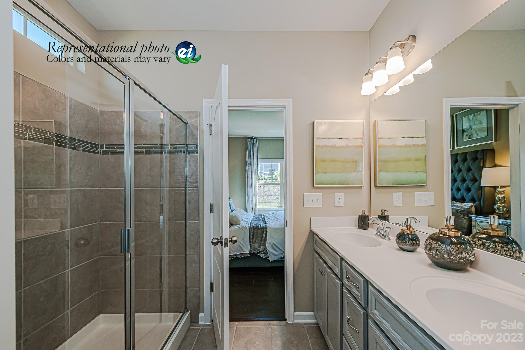 Tbd Gopher Road, Unit 332 Lancaster, SC 29720 - Photo 22 of 23 a bathroom with a double vanity sink a toilet and shower
