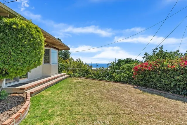 a view of a garden with pathway