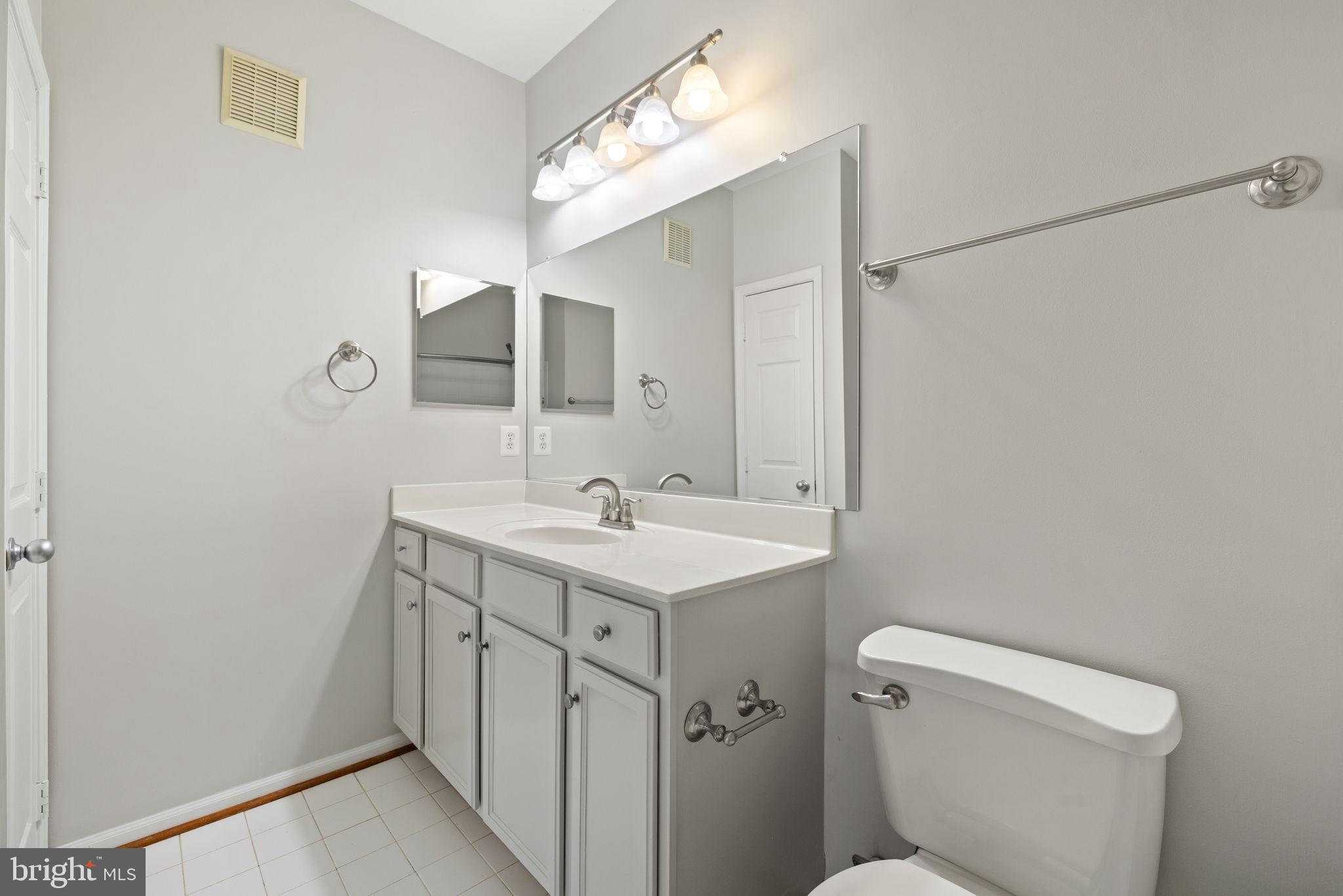 1519 North Point Drive, Unit 302 Reston, VA 20194 - Photo 20 of 33 Primary bath