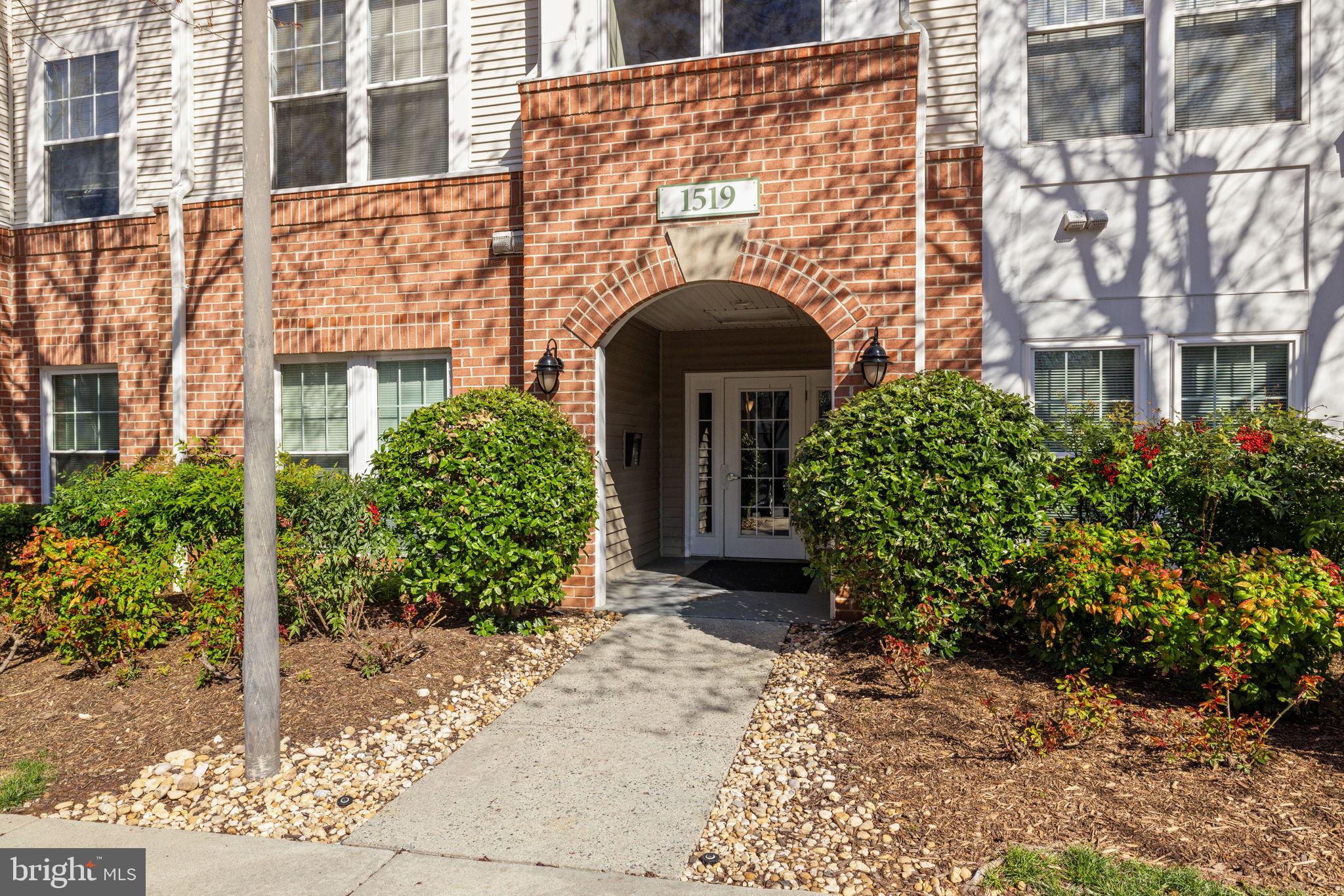 1519 North Point Drive, Unit 302 Reston, VA 20194 - Photo 2 of 33 Covered Entrance to secure building