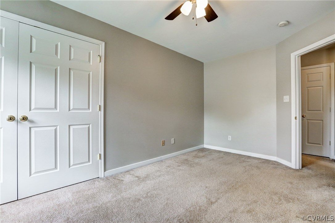 9430 Dunroming Road Chesterfield, VA 23832 - Photo 36 of 40 an empty room with chandelier fan