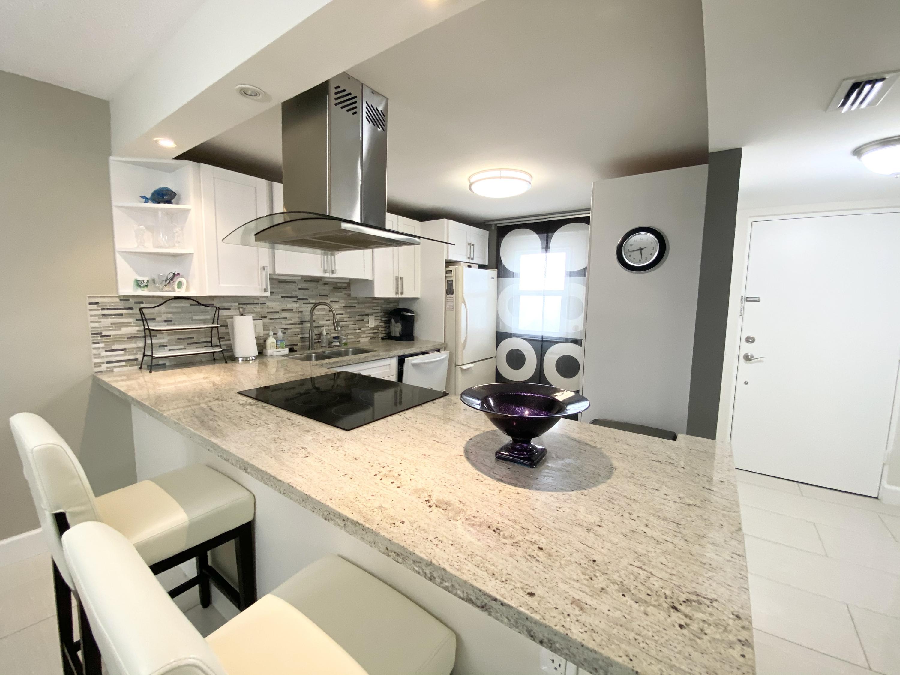 5700 Northwest 2nd Avenue, Unit 702 Boca Raton, FL 33487 - Photo 2 of 28 kitchen