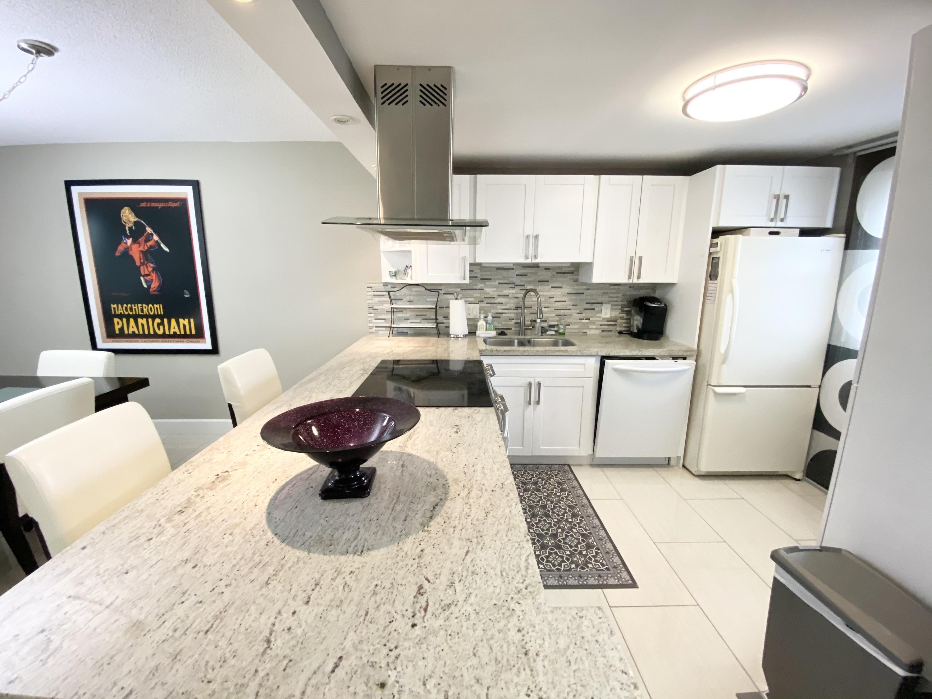 5700 Northwest 2nd Avenue, Unit 702 Boca Raton, FL 33487 - Photo 3 of 28 kitchen