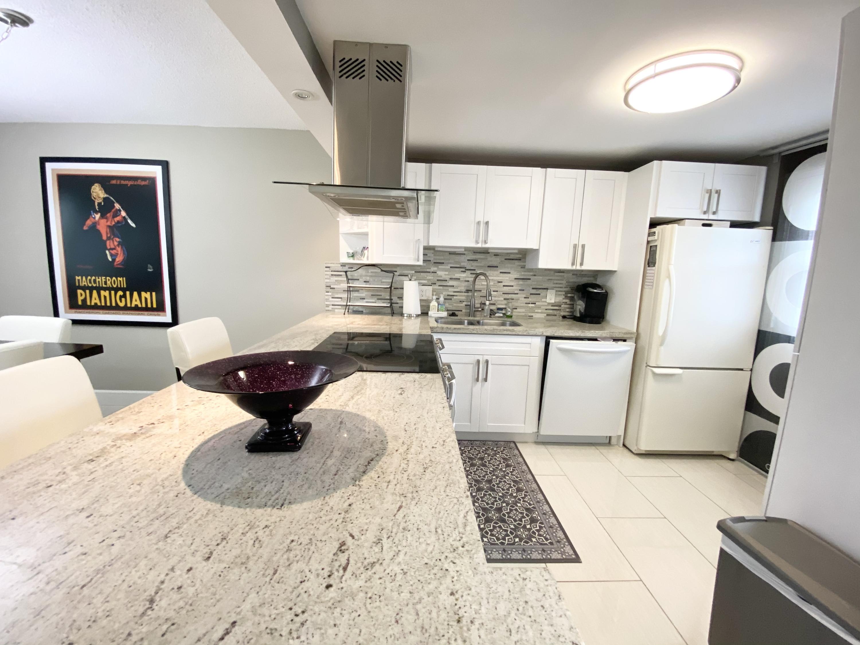 5700 Northwest 2nd Avenue, Unit 702 Boca Raton, FL 33487 - Photo 4 of 28 kitchen