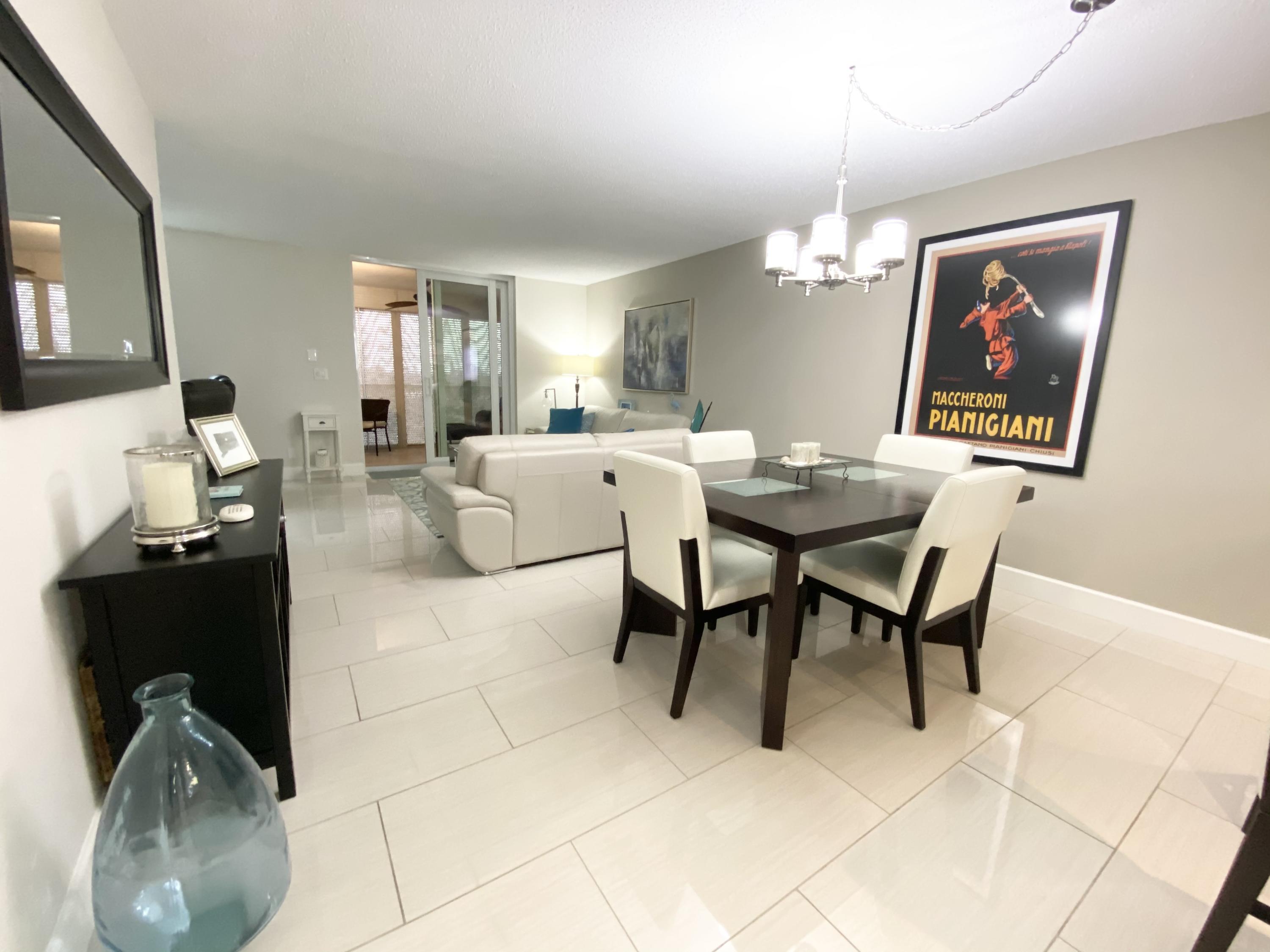 5700 Northwest 2nd Avenue, Unit 702 Boca Raton, FL 33487 - Photo 6 of 28 Living/Dining rooms