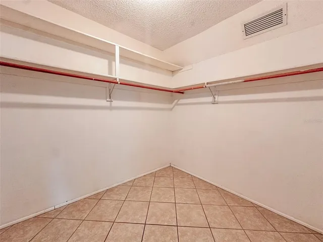 a view of a room with an empty walk in closet
