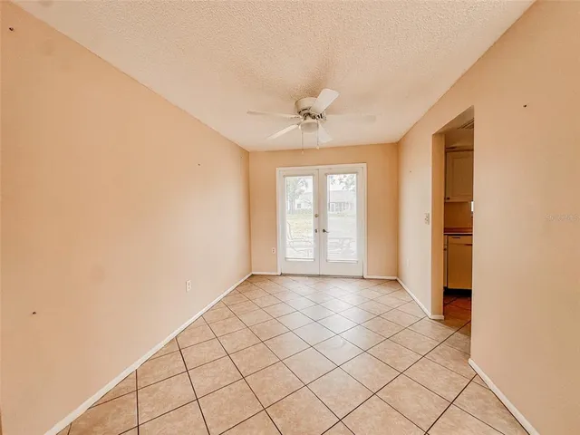 a view of an empty room with window