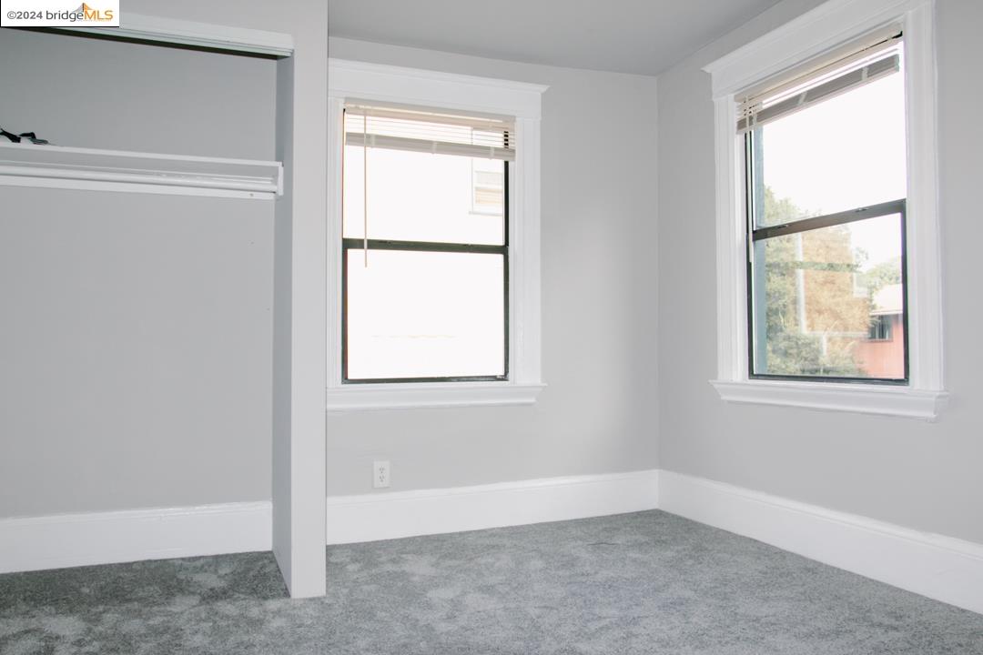 1173 12th Street Oakland, CA 94607 - Photo 21 of 21 a view of an empty room with a window