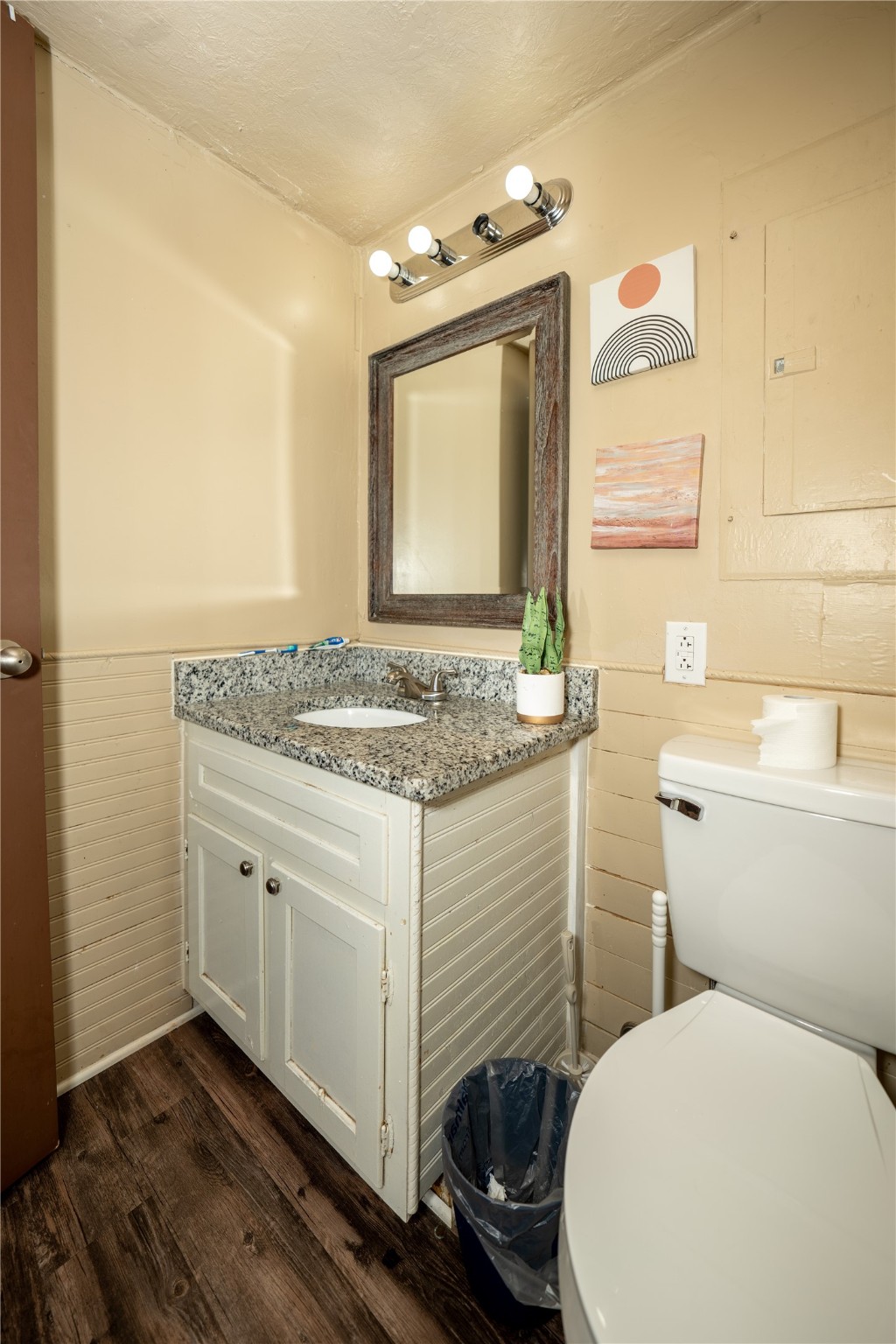 134 Briargrove Road Crockett, TX 75835 - Photo 17 of 24 a bathroom with a granite countertop toilet sink and mirror