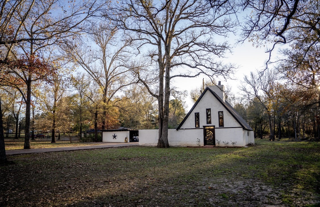 134 Briargrove Road Crockett, TX 75835 - Photo 21 of 24 a view of a large house with a yard