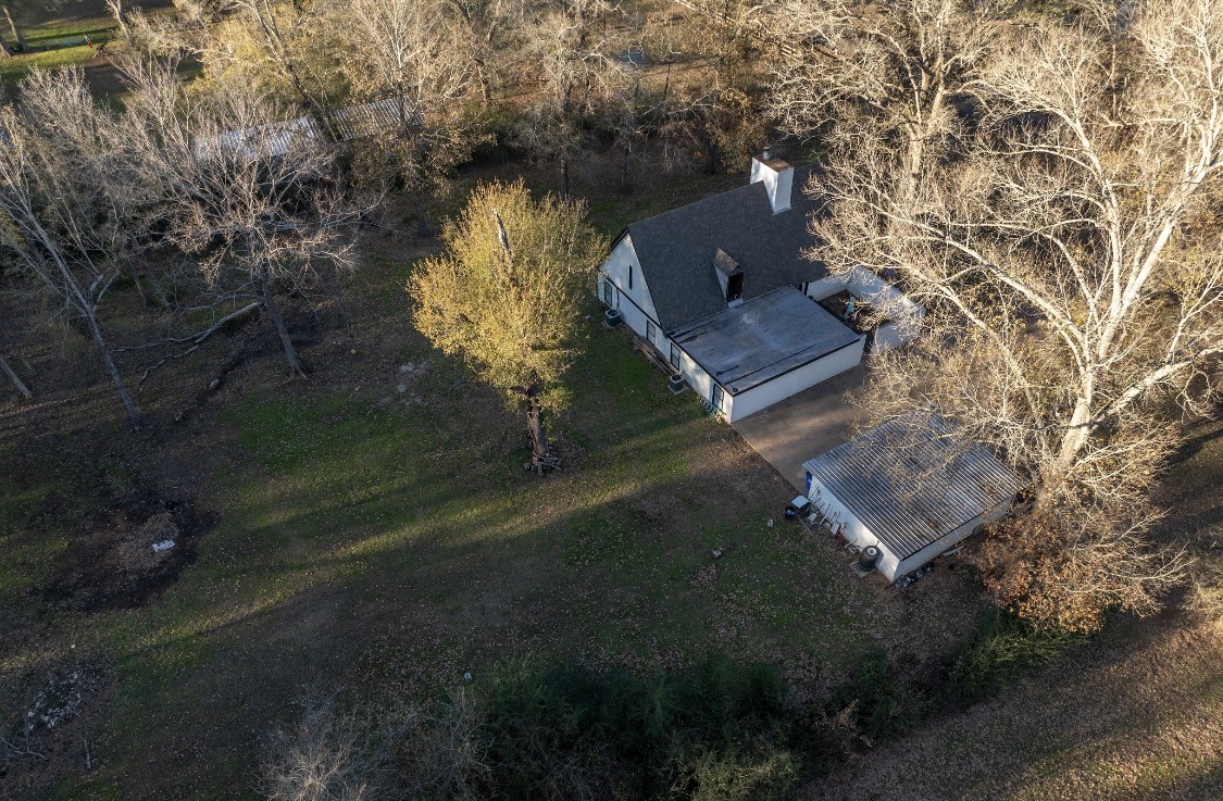 134 Briargrove Road Crockett, TX 75835 - Photo 22 of 24 an aerial view of a house with a yard basket ball court and outdoor seating
