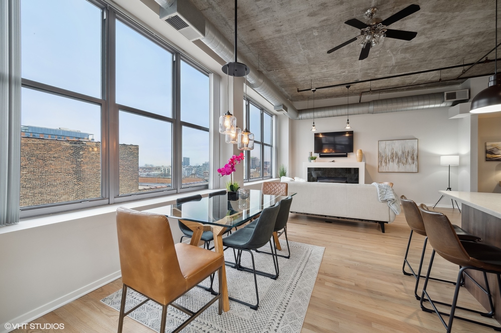 933 West Van Buren Street, Unit 917 Chicago, IL 60607 - Photo 9 of 24 a view of a dining room with furniture window and outside view
