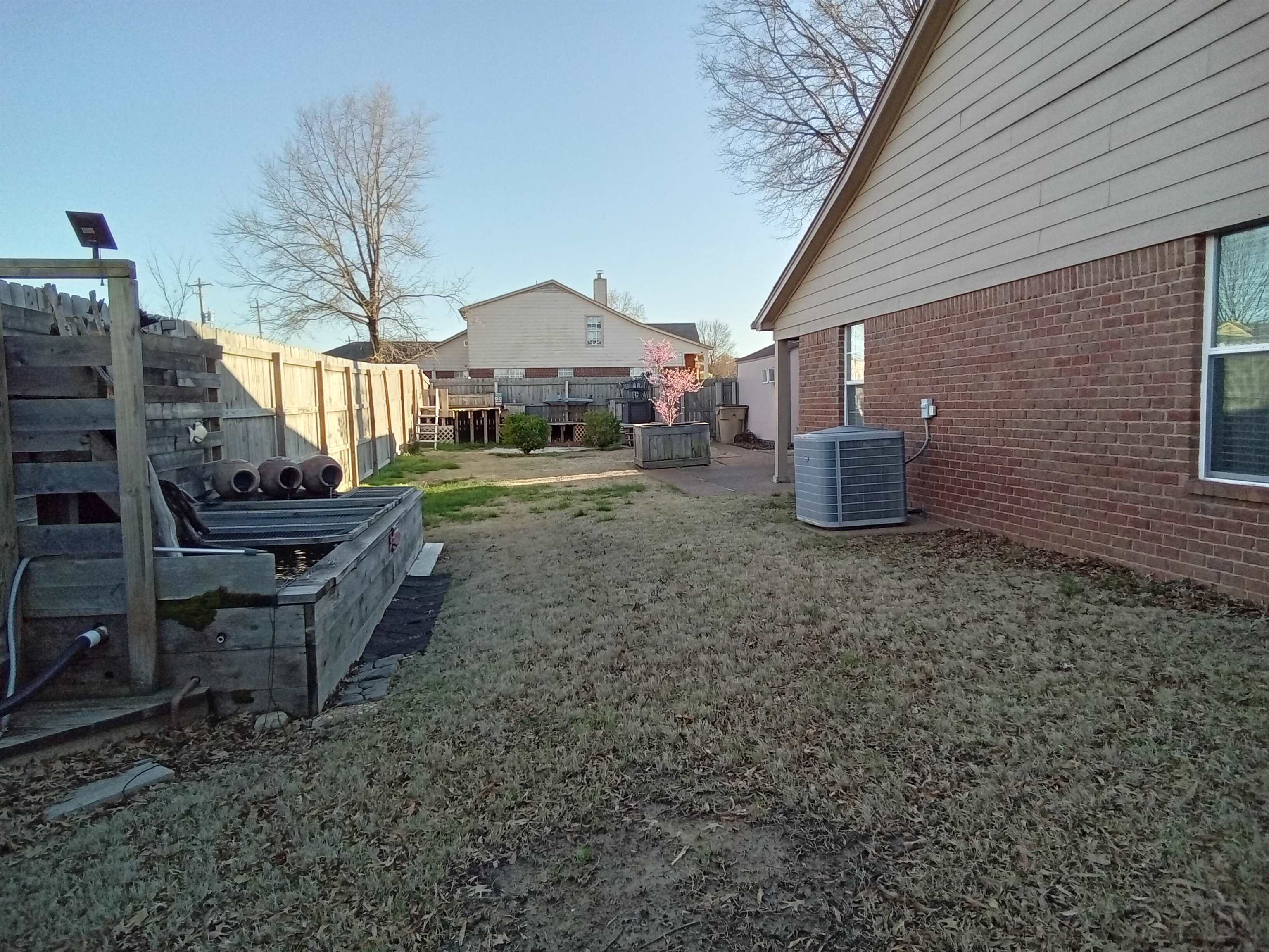 6907 Manslick Road Cordova, TN 38018 - Photo 19 of 24 View of fenced backyard