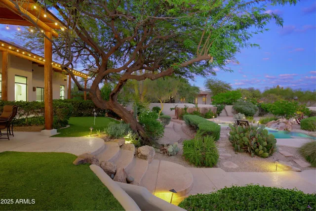 a view of a backyard with a garden