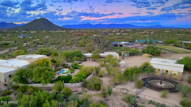 a view of a city with mountains in the background