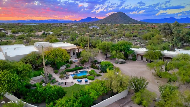 a view of a garden with a houses