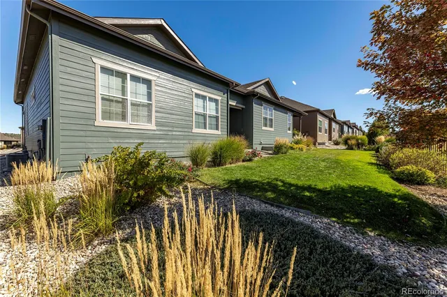 a front view of house with yard