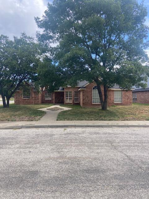 8101 Sheldon Road Amarillo, TX 79119 - Photo 1 of 12 a view of a house with a yard