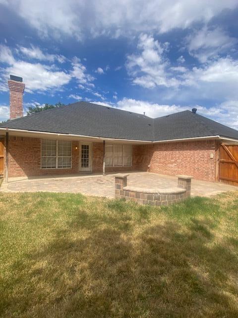8101 Sheldon Road Amarillo, TX 79119 - Photo 2 of 20 a front view of a house with a yard