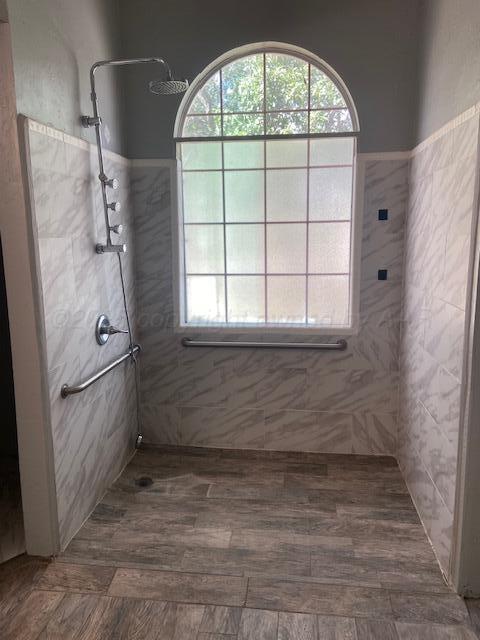 8101 Sheldon Road Amarillo, TX 79119 - Photo 2 of 12 view of empty room with a window