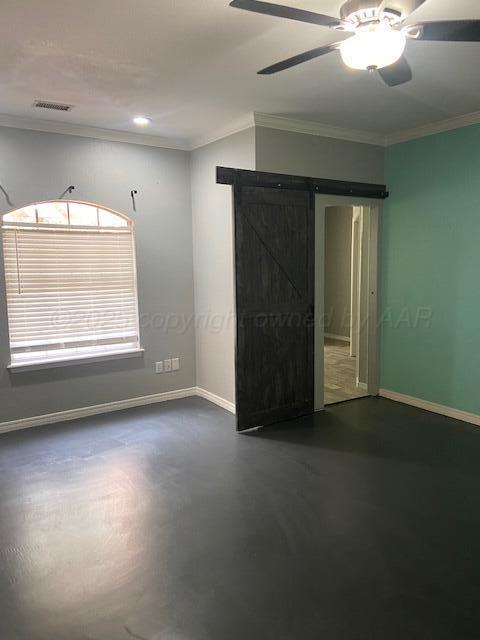 8101 Sheldon Road Amarillo, TX 79119 - Photo 10 of 20 an empty room with windows and closet