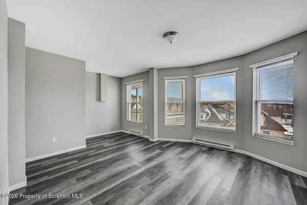 an empty room with windows