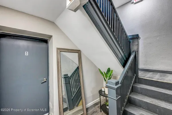 a view of kitchen with wooden floor