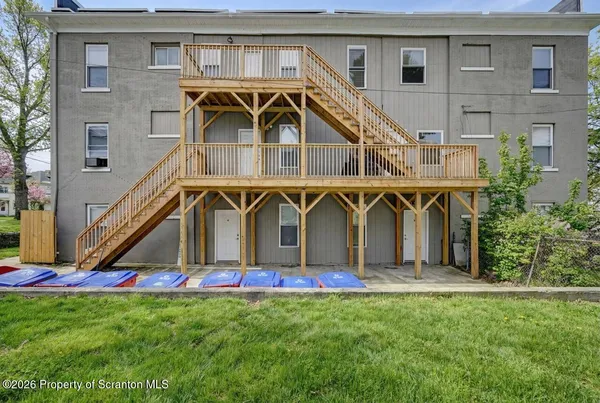 a front view of a house with yard