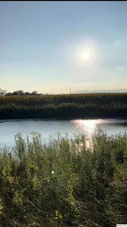 a view of mountain with lake view
