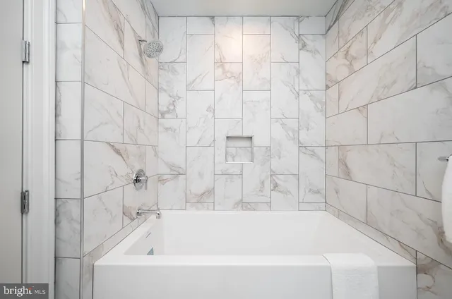 a bathroom with a bathtub