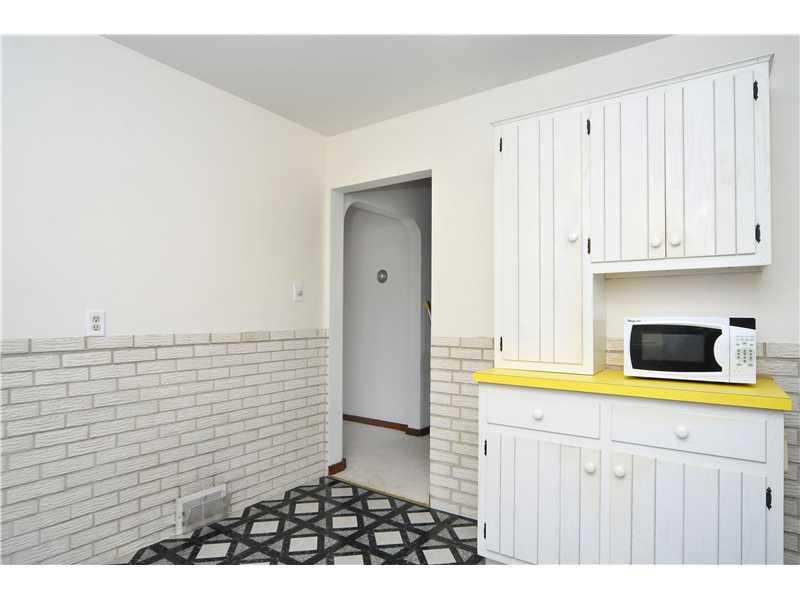 42 Coraopolis Road Coraopolis, PA 15108 - Photo 4 of 17 Kitchen. A view of the kitchen leading to the living room