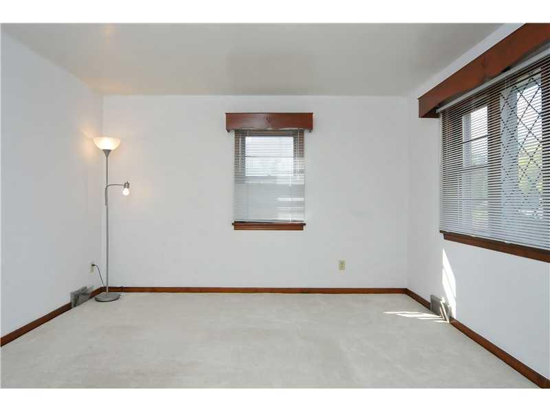 42 Coraopolis Road Coraopolis, PA 15108 - Photo 6 of 17 Living Room. The living room has been freshly painted and has newer carpet.