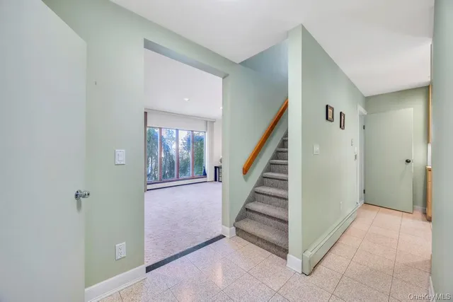 a view of a hallway with entryway