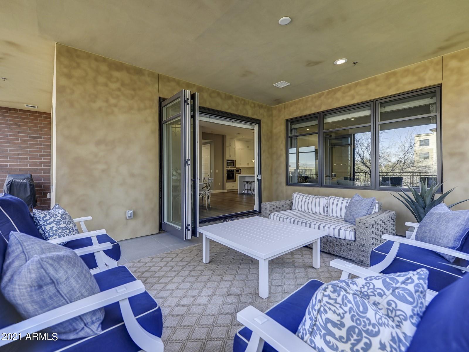6166 North Scottsdale Road, Unit A2002 Paradise Valley, AZ 85253 - Photo 12 of 35 012_Patio Sitting