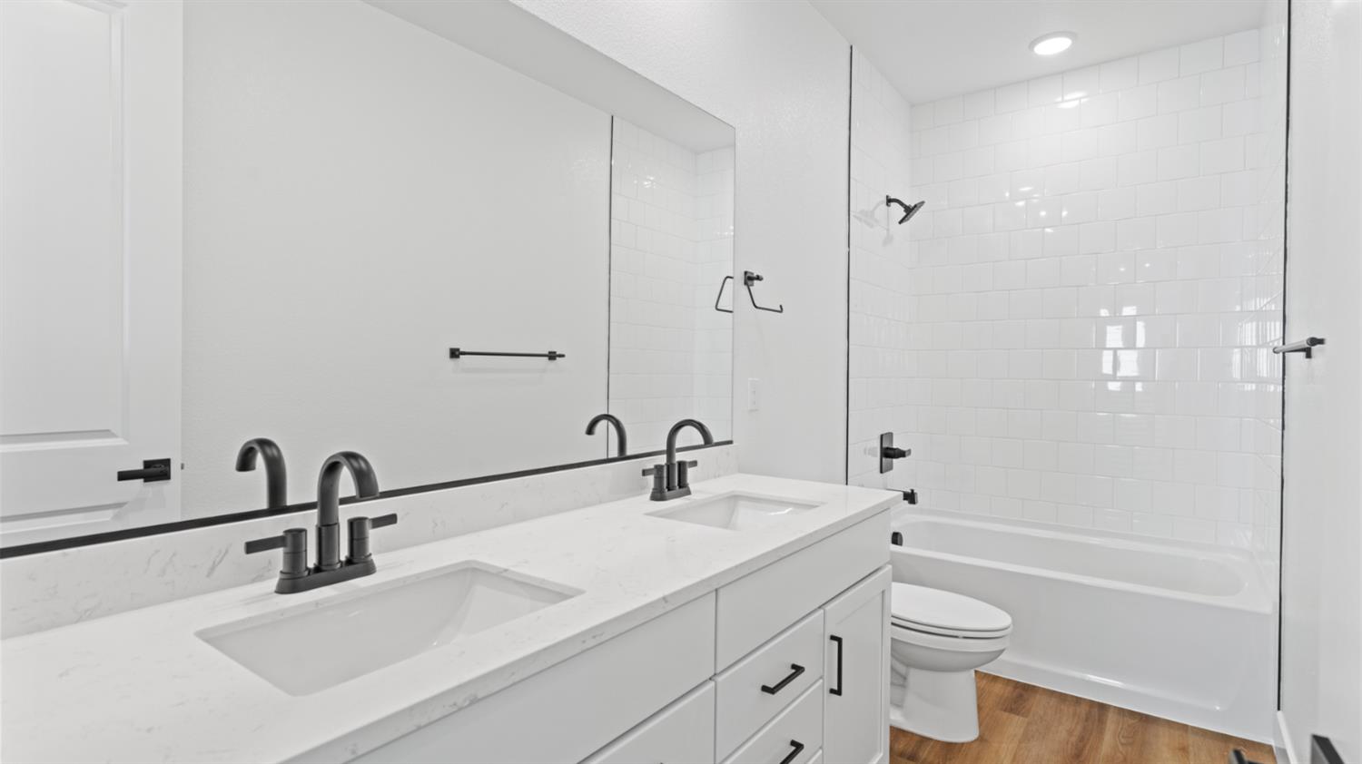 775 Lorca Street Mountain House, CA 95391 - Photo 23 of 41 a bathroom with a sink toilet a shower and a mirror
