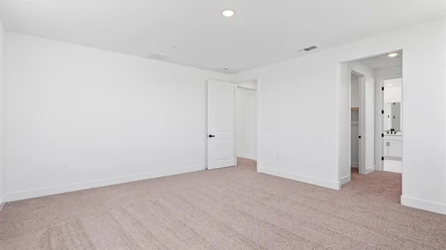 a view of a bathroom with mirror