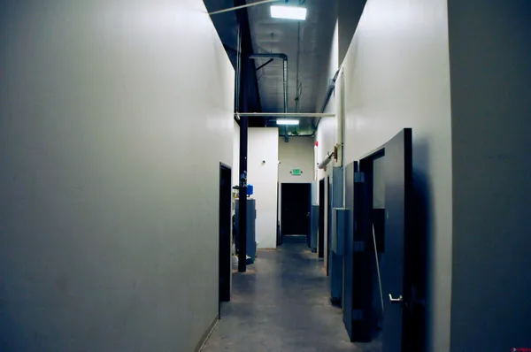 a view of a hallway with elevator