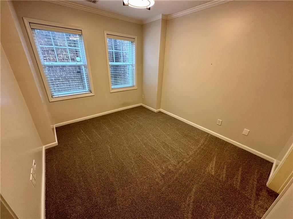 1615 Rivers Edge Trail Northeast Atlanta, GA 30324 - Photo 17 of 26 an empty room with windows